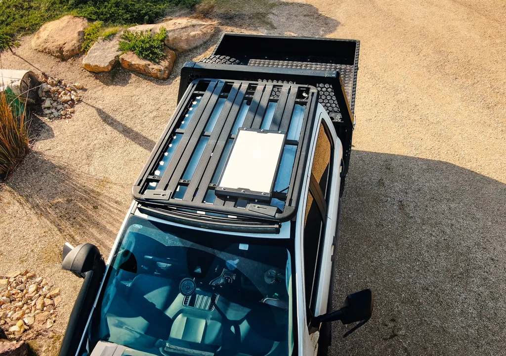 Aerial view of a 4WD roof rack fitted with a Boss Starlink Gen 3/4 Mount and dish