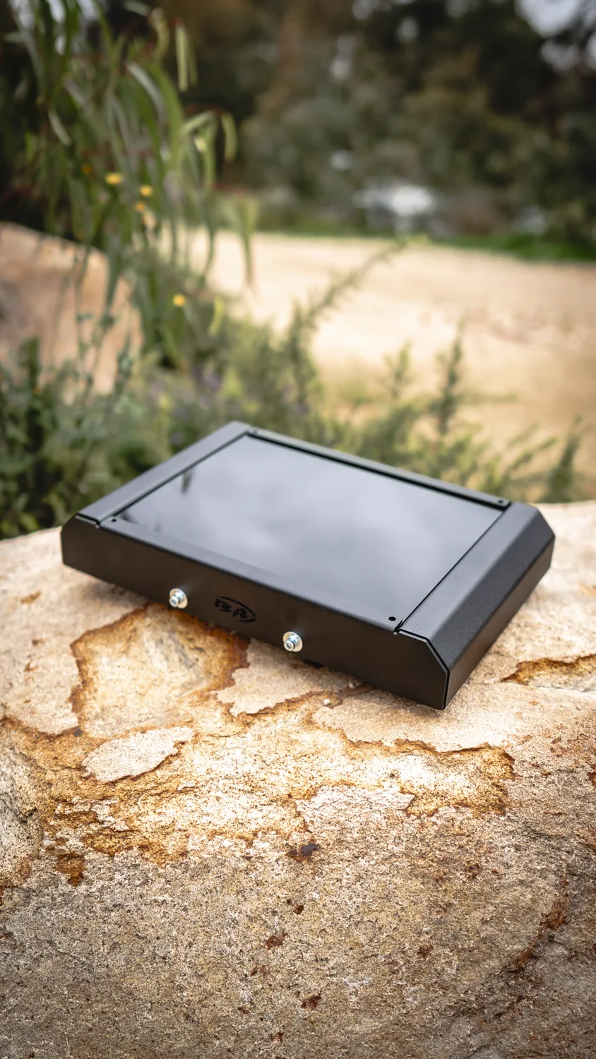 Boss Starlink Mini Core Mount displayed outdoors on a rock