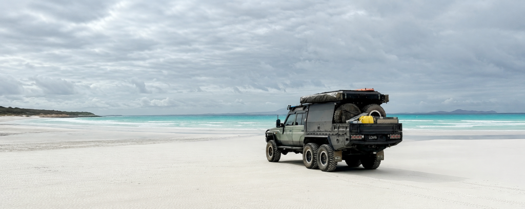 Boss-built 6x6 Land Cruiser with a Starlink Mini mount, tested on the beach at Cape Arid National Park, Western Australia