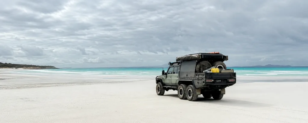 Boss-built 6x6 Land Cruiser with a Starlink Mini mount, tested on the beach at Cape Arid National Park, Western Australia