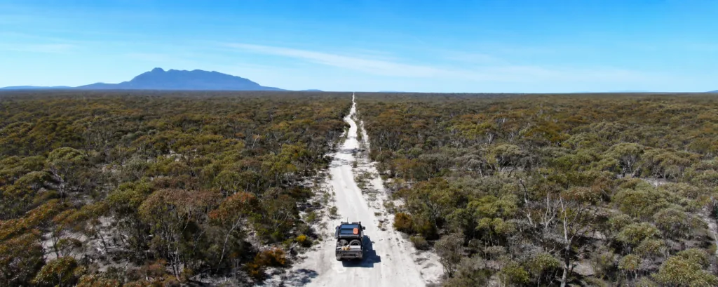 Aerial view of the Balladonia Track leading towards Mount Ragged in remote Western Australia