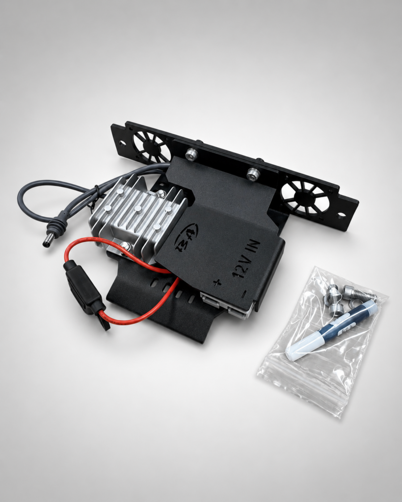 Boss Step-Up Power Module kit — step-up converter on its black powder-coated bracket with fused 12V lead and mounting hardware