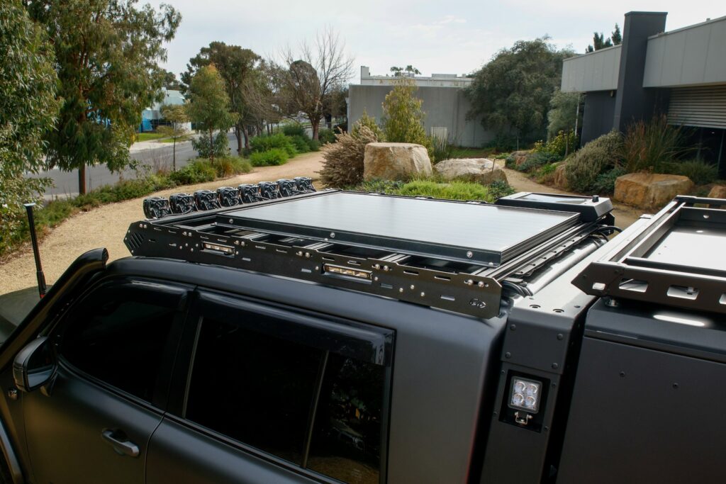 Boss LC300 JMACX Chop Cab Rack viewed from the rear roofline, showing mounting rails and side lighting