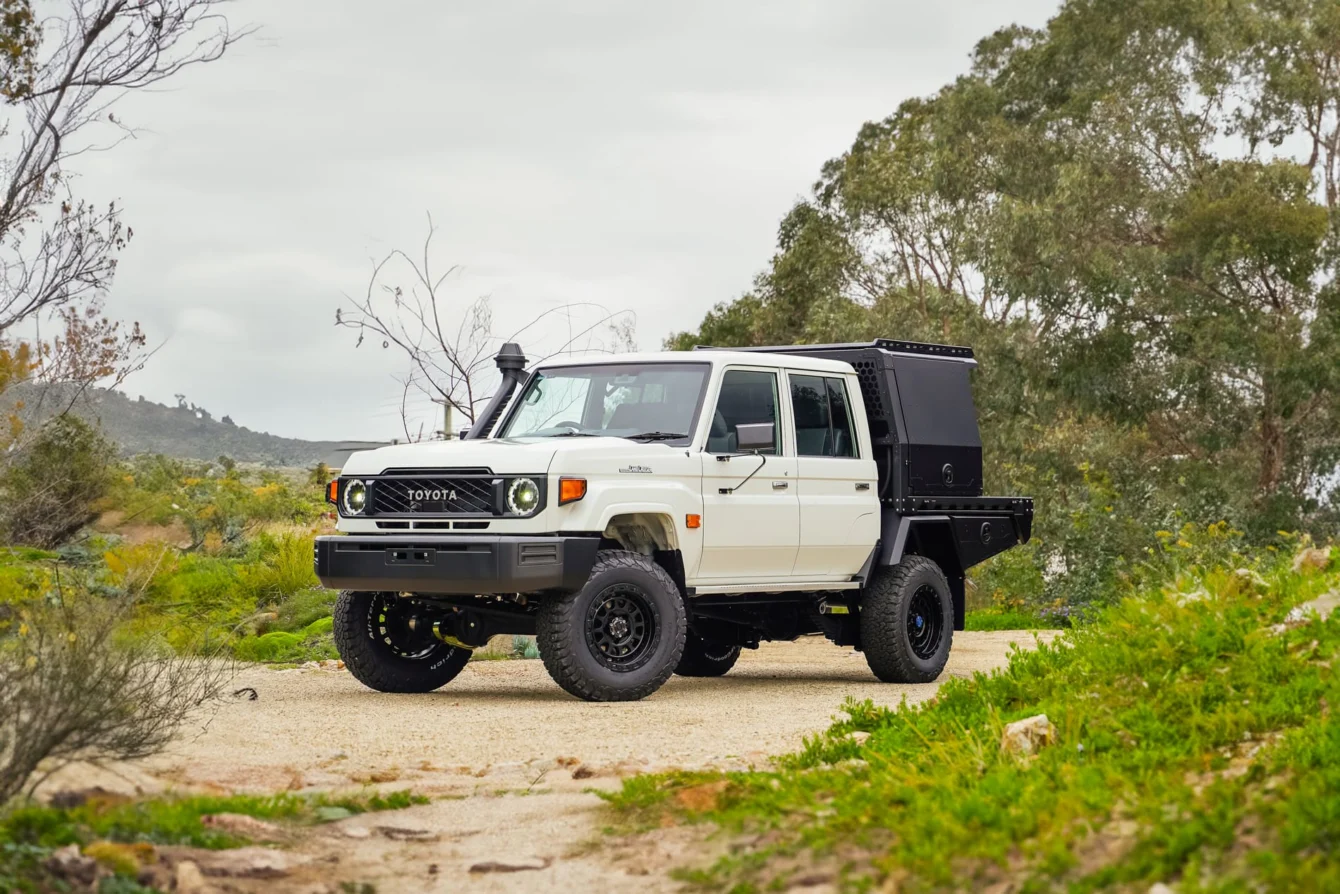 LandCruiser 79 dual cab with a Boss half canopy and open deck