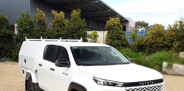2026 Toyota HiLux with a Boss flatbed tray and two full-length toolboxes